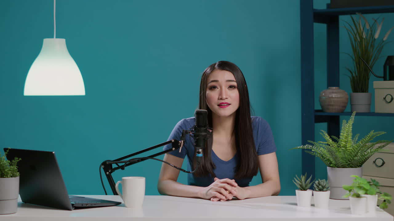 POV of lifestyle influencer recording online podcast in studio