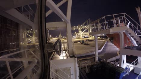 timelapse of shifting containervessel during dusk and night