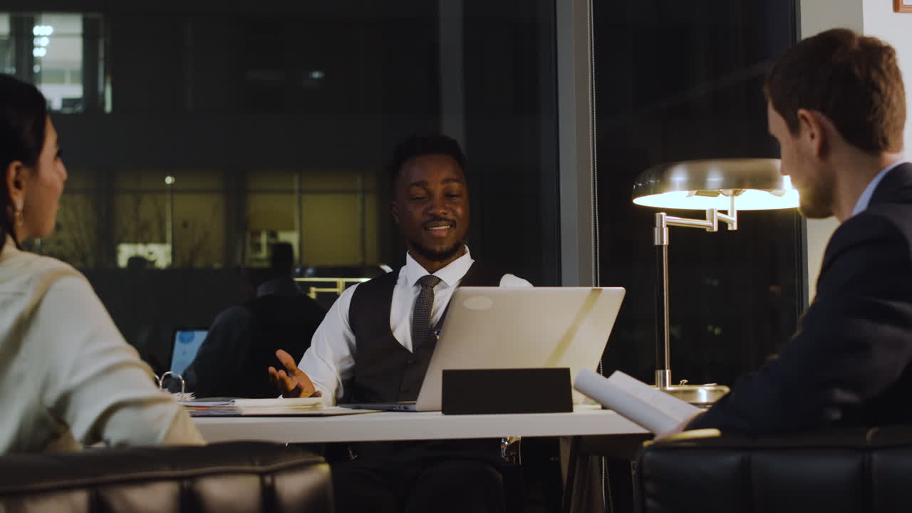 Workers in the office at night