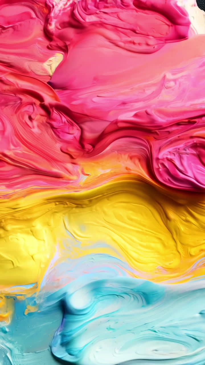 A painting of many colors with a rainbow effect. The colors are bright and vibrant, creating a cheerful and lively mood. The painting seems to be a representation of the beauty and diversity of nature