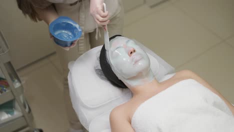 facial mask application at spa