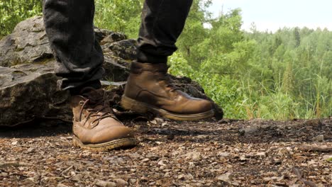 hiking boots on a rocky trail in the forest