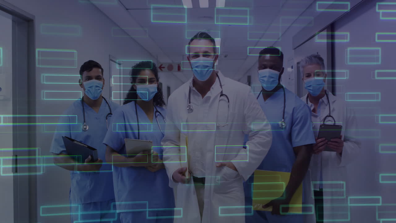 In hospital corridor, healthcare professionals reviewing digital data with animation overlay