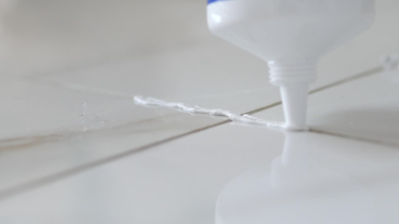 Repairing a Crack in Tiles with Adhesive