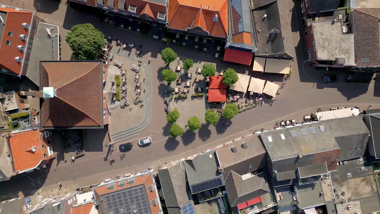 Top-down aerial view of the beautiful Dutch village Arcen neighbourhood, supermarket, Former hall town building, Limburg, Netherlands