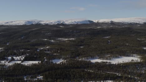 Aerial-view-slow-drone-shot-winter-landscape-in-the-northern-parts-of-Sweden