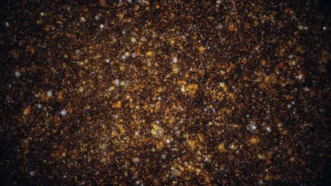 brillo dorado abstracto con bokeh.