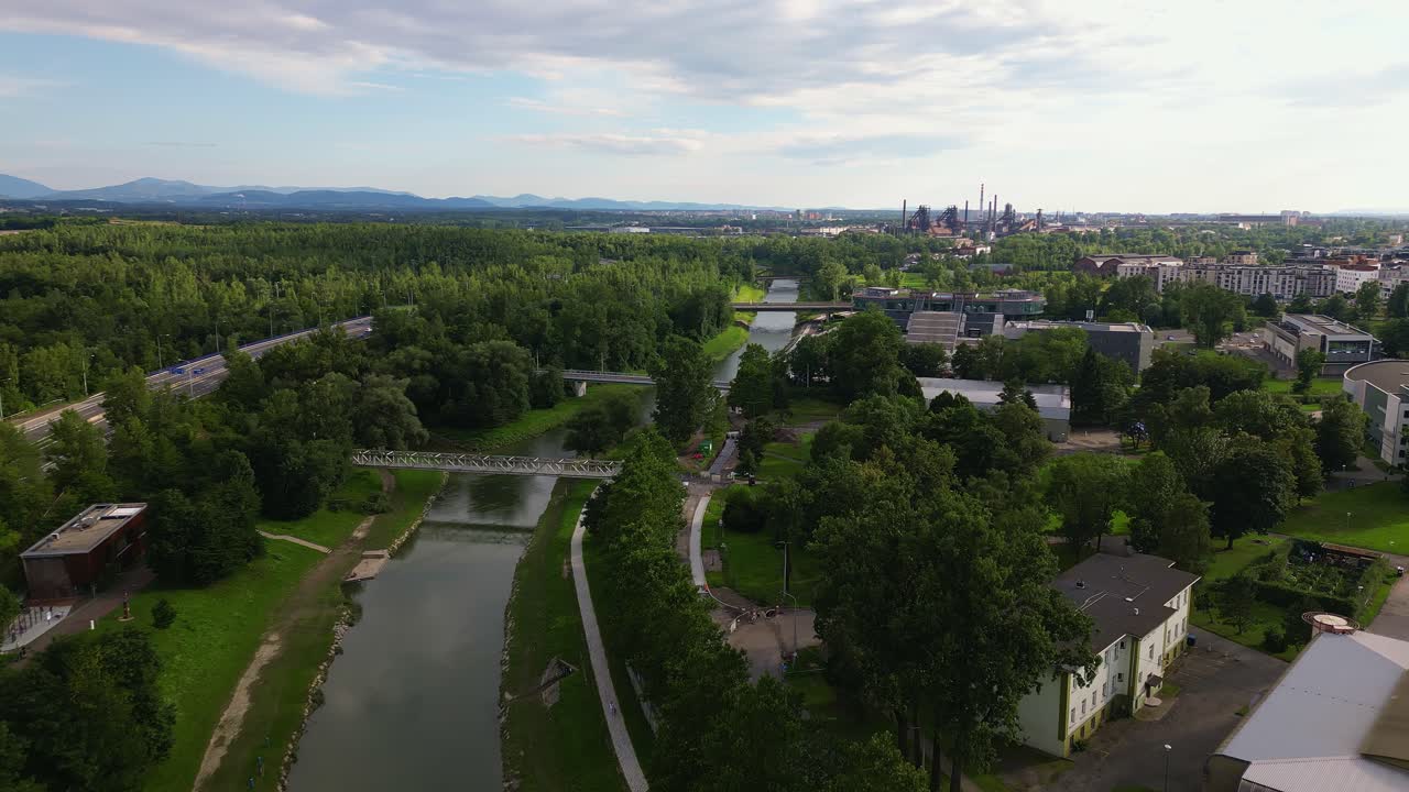 River Ostravice leading to industrial skyline Ostrava landscape AERIAL