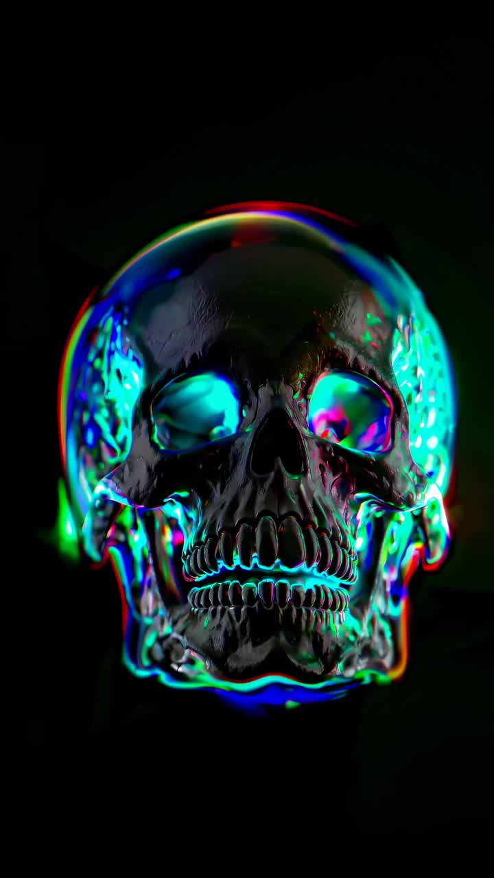 A close-up, front-facing angle of a reflective skull with vibrant neon lighting, creating a surreal