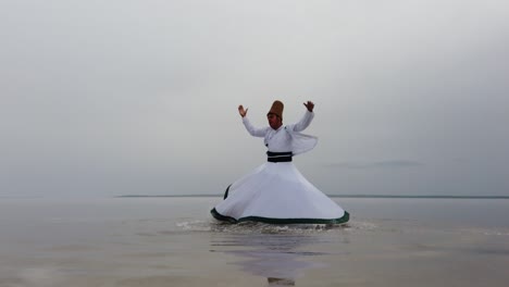 sunset and whirling at the sea, sufi. sufi whirling (turkish: semazen) is a form of sama or physically active meditation which originated among sufis. 4k