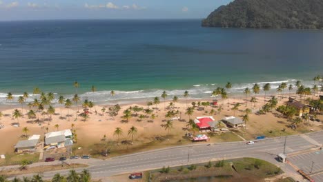 revealing aerial of maracas bay famously known for the delicacy of bake and shark on the caribbean island of trinidad