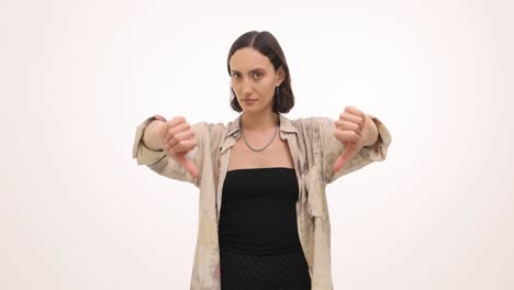 a woman giving two thumbs down gestures