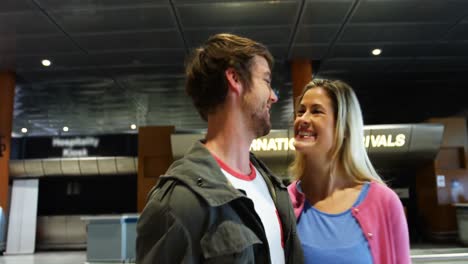 couple interacting with each other while walking