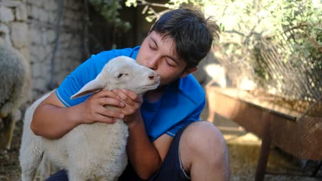 young shepherd loving lamb