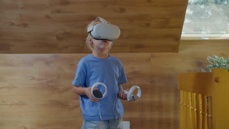 six-year-old girl in blue shirt playing vr game