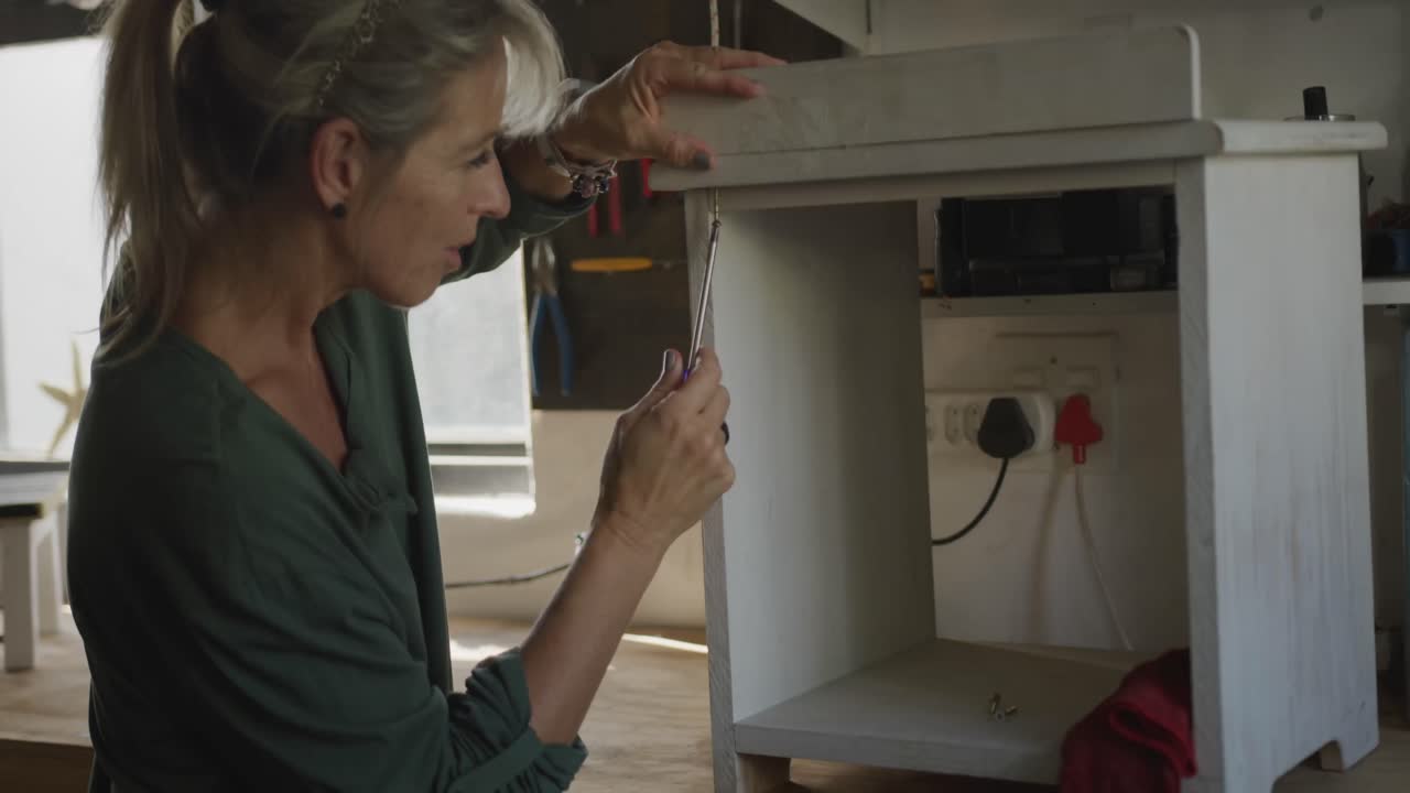 Woman doing DIY at home