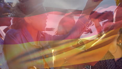 composite video of waving germany flag over group of diverse friends toasting beers in the car