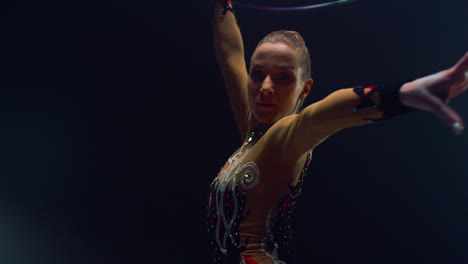 Attractive-woman-performing-hula-hoop.-Girl-practicing-rhythmic-gymnastics