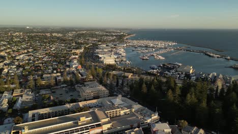 aerial panorama view of perth cityscape and fremantle sailing club during golden sunset, western australia - beautiful wide shot on pacific ocean