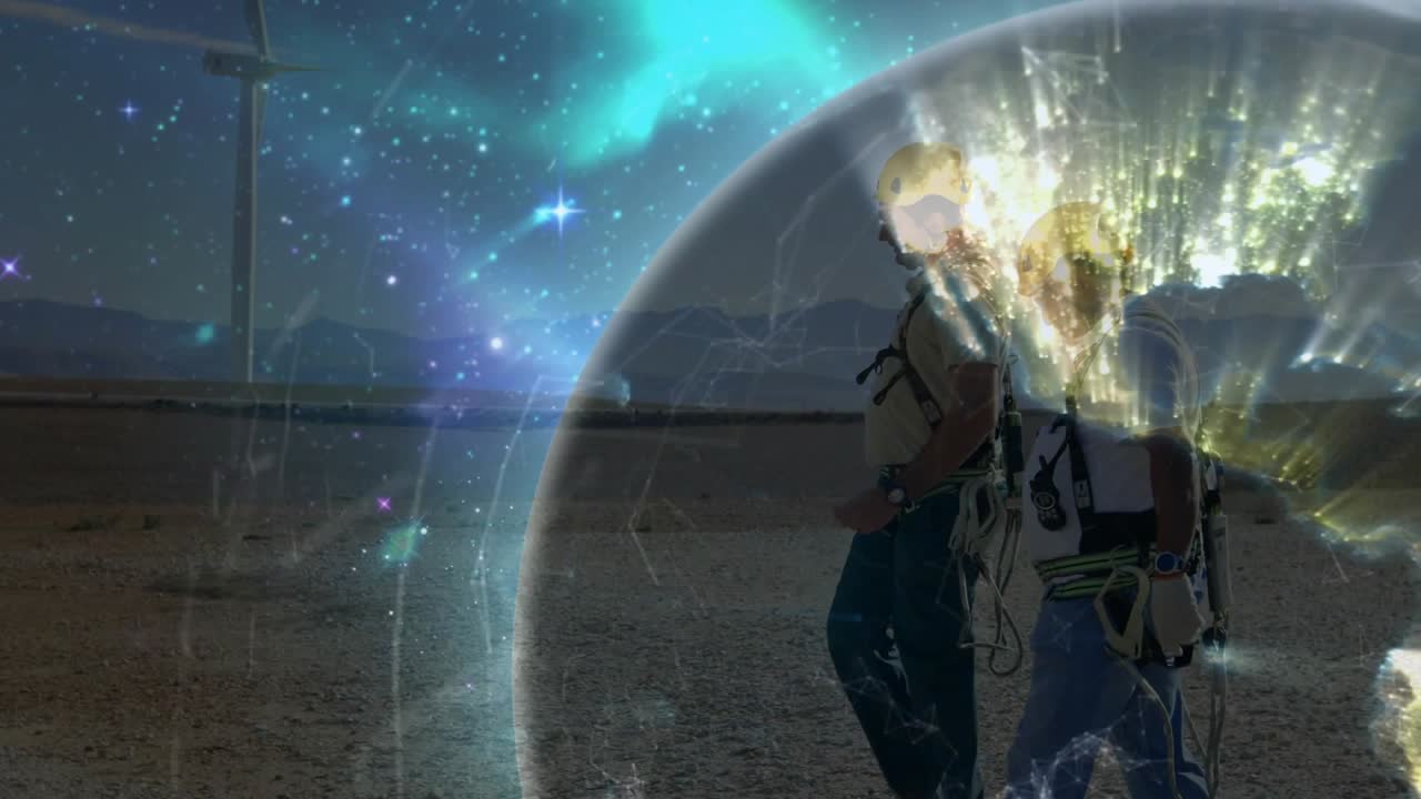 Technicians walking across energy site initiating rotating globe showing network lines for analysis