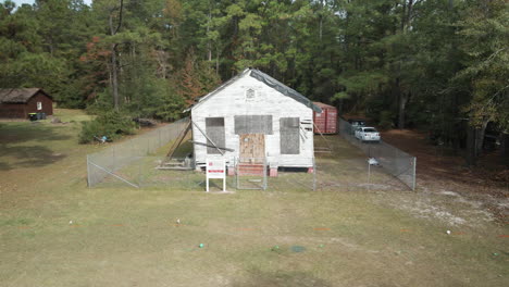 Wooden-cabin-dilapidating-within-wilderness