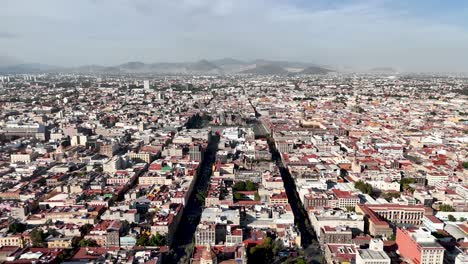 lateral drone shot of downtown mexico city and zocalo