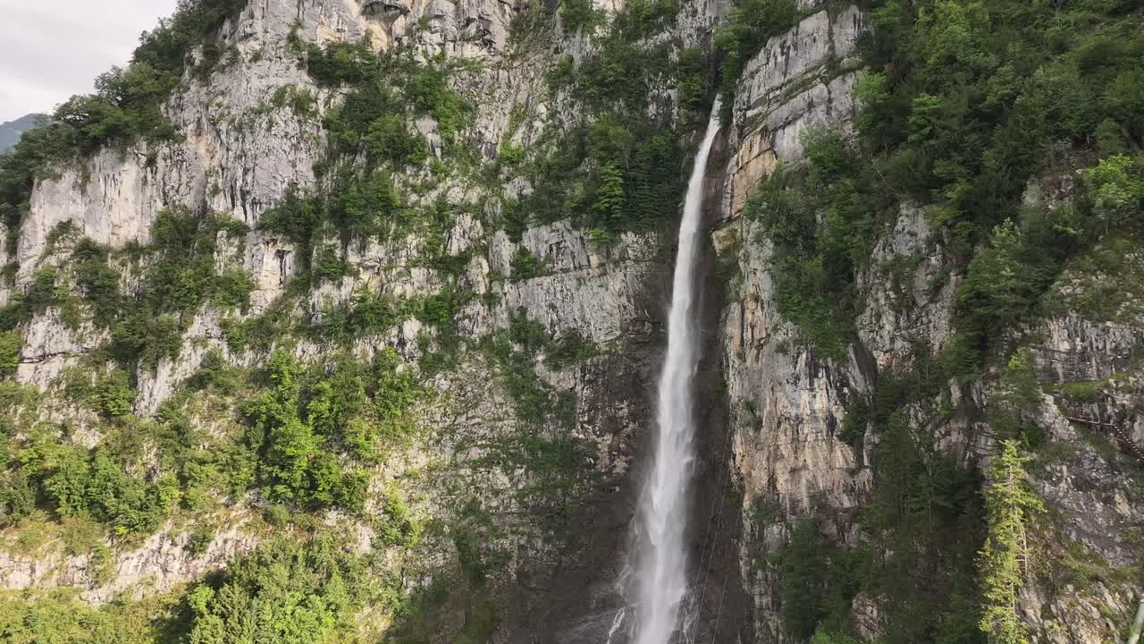 Drone view of the Seerenbachfälle waterfalls near Amden and Betlis, cascading down rocky cliffs into the Walensee region, Switzerland