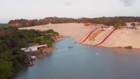 Aerial:-Sand-and-waterslides-in-the-dunes-of-Cumbuco,-Brazil