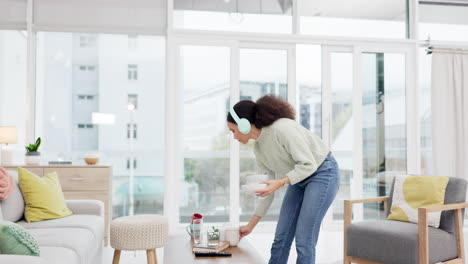 cleaning, music and dance with woman in living