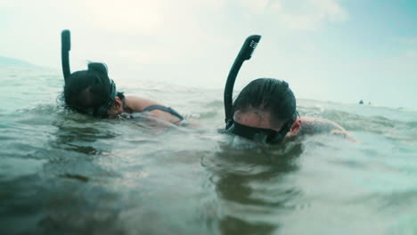 couple diving on the sea