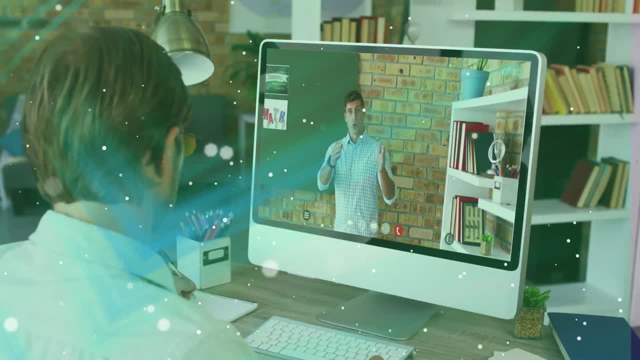 Animation of light spots over caucasian businessman using computer for online meeting