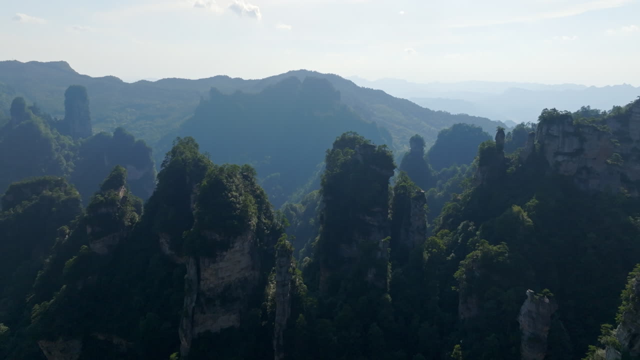 AERIAL. Stunning Avatar mountain peaks in Zhangjiajie natural forest park, China