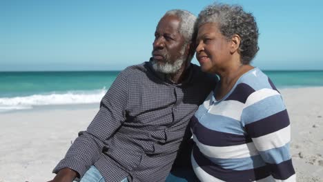 Senior-couple-enjoying-free-time-at-the-beach