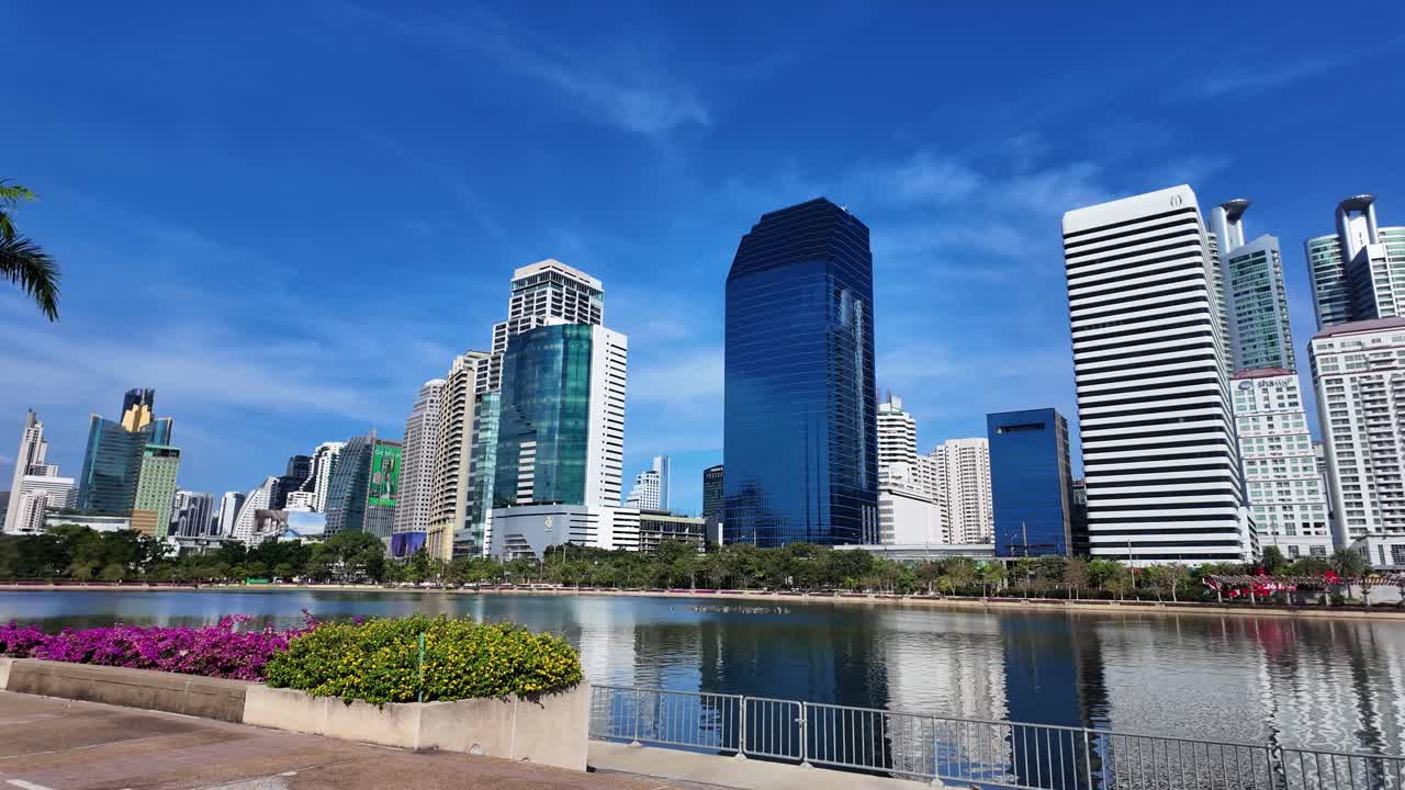 Bangkok modern city buildings skyline view from Benjakitti park Thailand