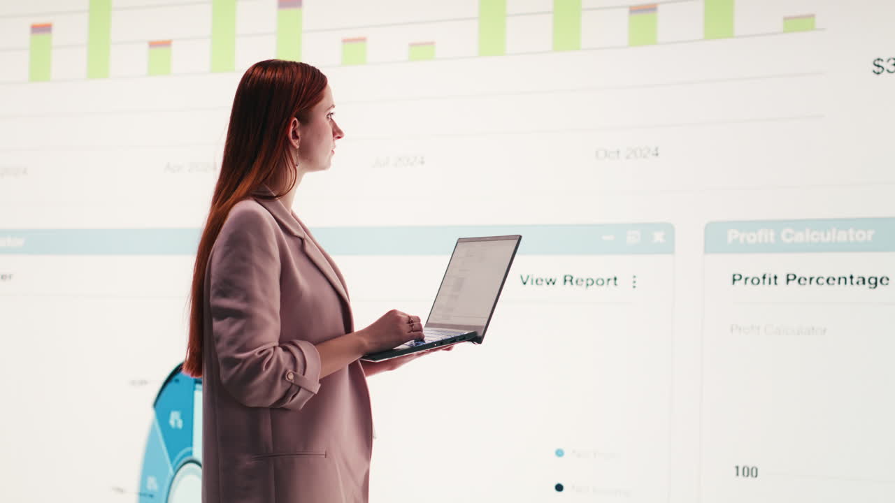 Young Businesswoman Analyzing Financial Data on Laptop with Charts