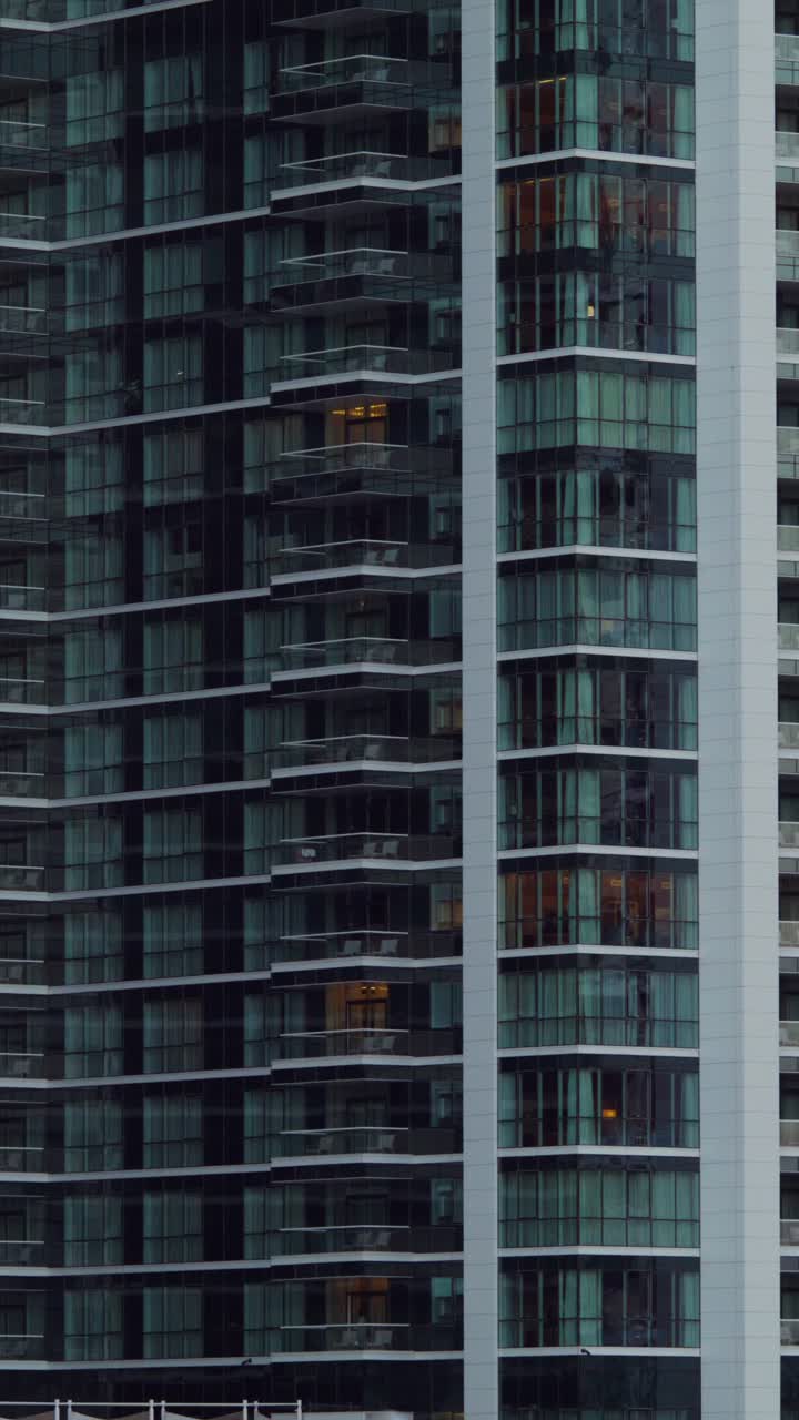 Modern High-Rise Apartment Building at Night