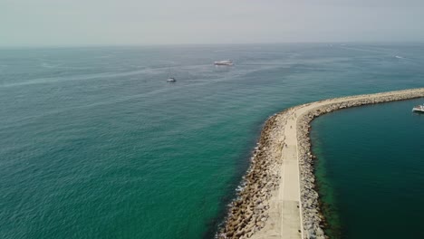 the serene puerto banus marina in marbella, spain, showcasing boats and calm waters, aerial view