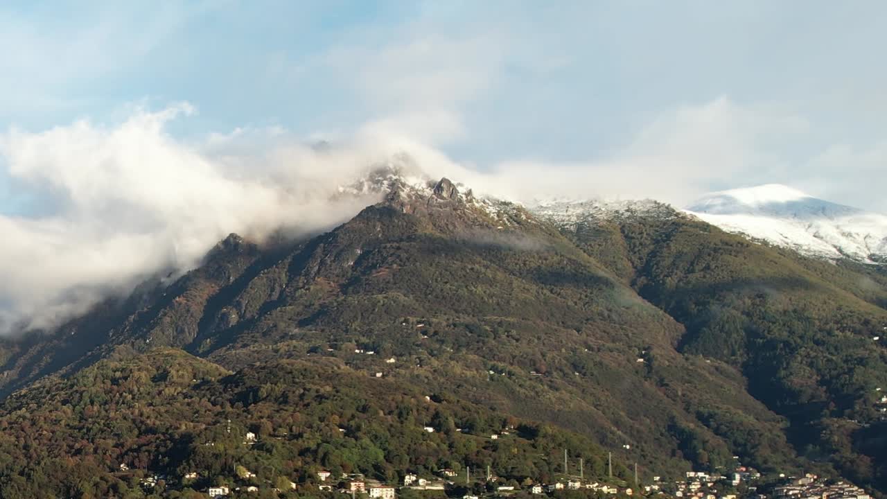 Majestic aerial view of the Alps in Italy showcasing snow-capped peaks