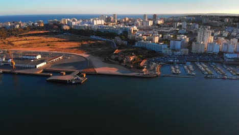 aerial footage of a beautiful view port from above in portimao, portugal 4k