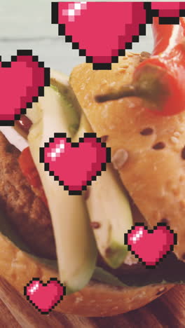 animación de corazones flotando sobre la hamburguesa en una tabla de madera