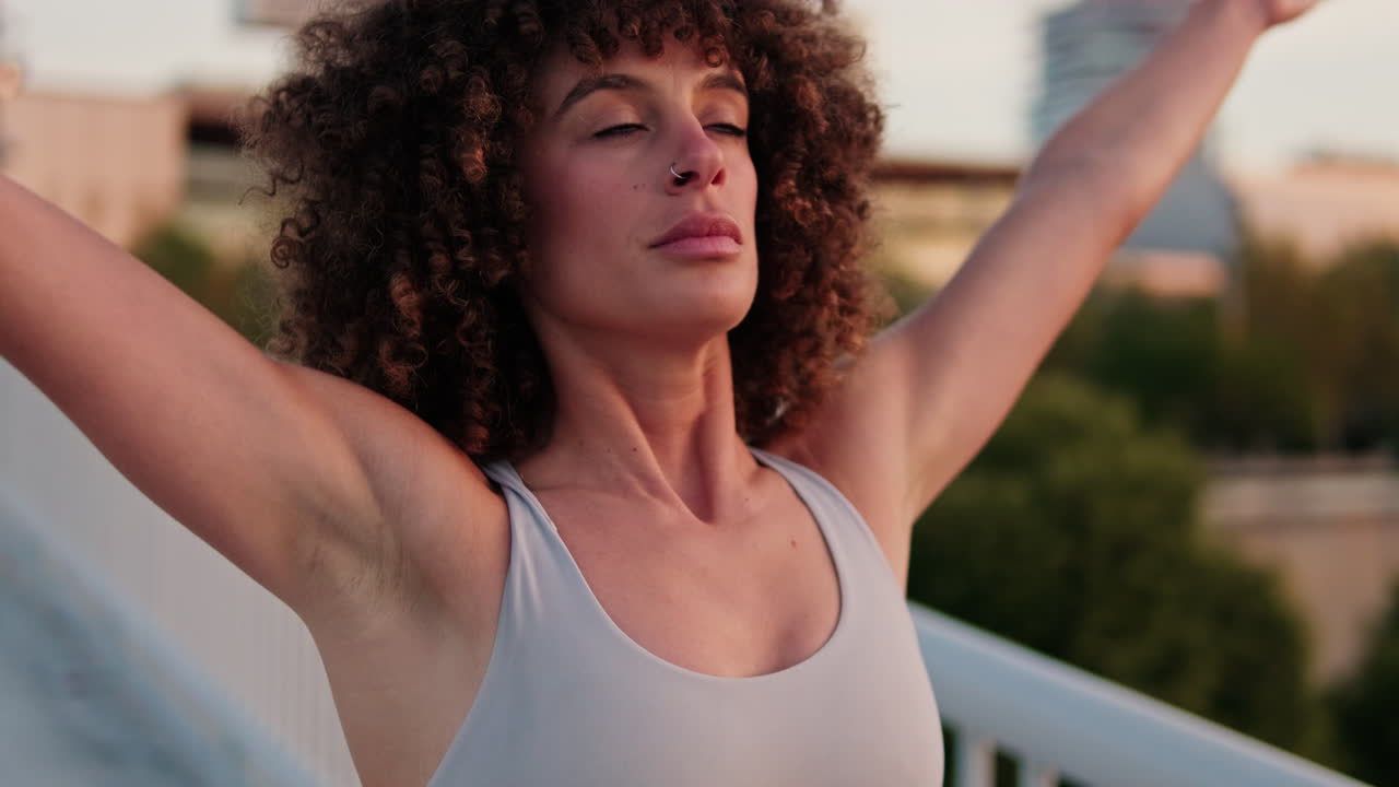 Woman Doing Fitness Exercises on a Bridge