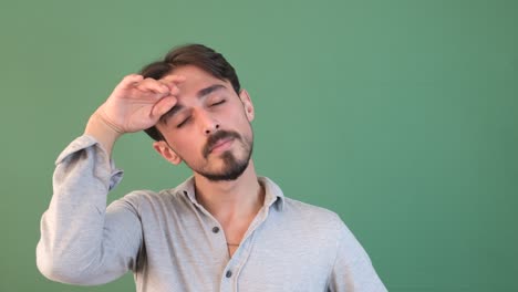 Guy-Boring--and-Sleepy-Green-Background