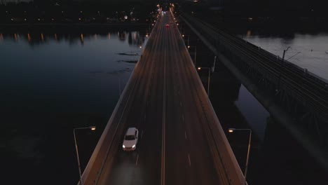 a car drives over the gdanski bridge in warsaw