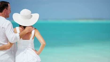 male female caucasian couple sharing kiss on vacation