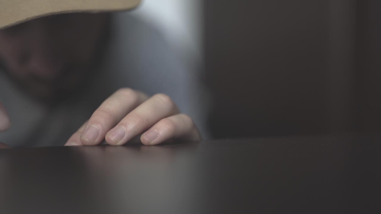 Close up man fingers putting led lights in table, static shot