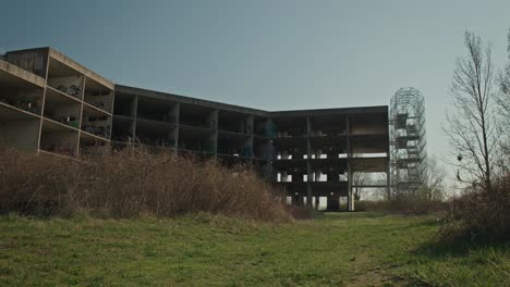 abandoned university hospital in zagreb, overtaken by nature and urban art