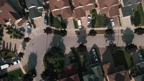 top-down aerial drone footage of colorful suburban homes