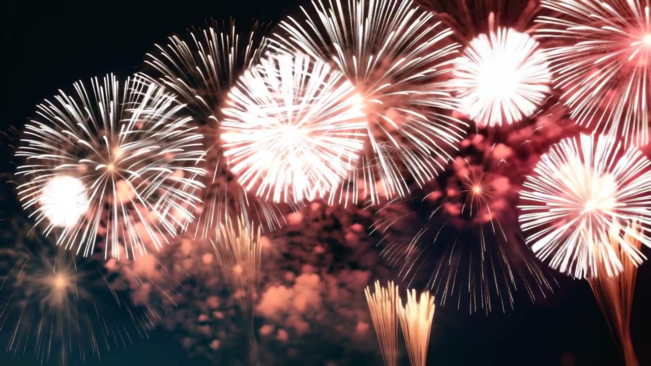 Spectacular Red and White Fireworks Exploding in the Night Sky