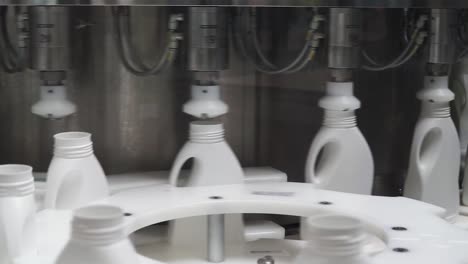 bottle filling and capping machine in action