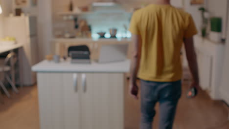 man using voice activated application holding smartphone
